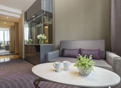 Family Suite with Living Room: Our Family Suite can comfortably accommodate up to 5 guests