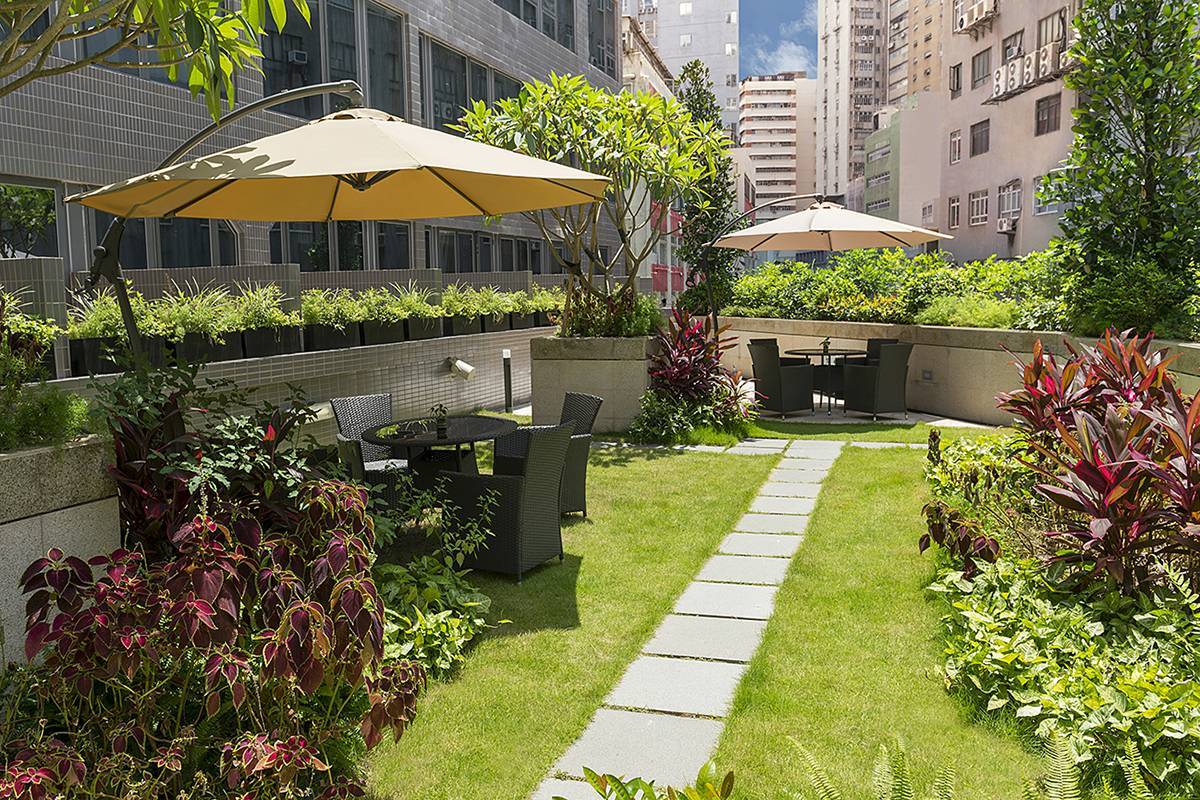 Garden Terrace: Soak up rays while sunbathing in a lush garden setting